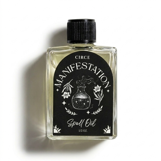 Manifestation spell oil in a half ounce twist-top glass bottle, front view