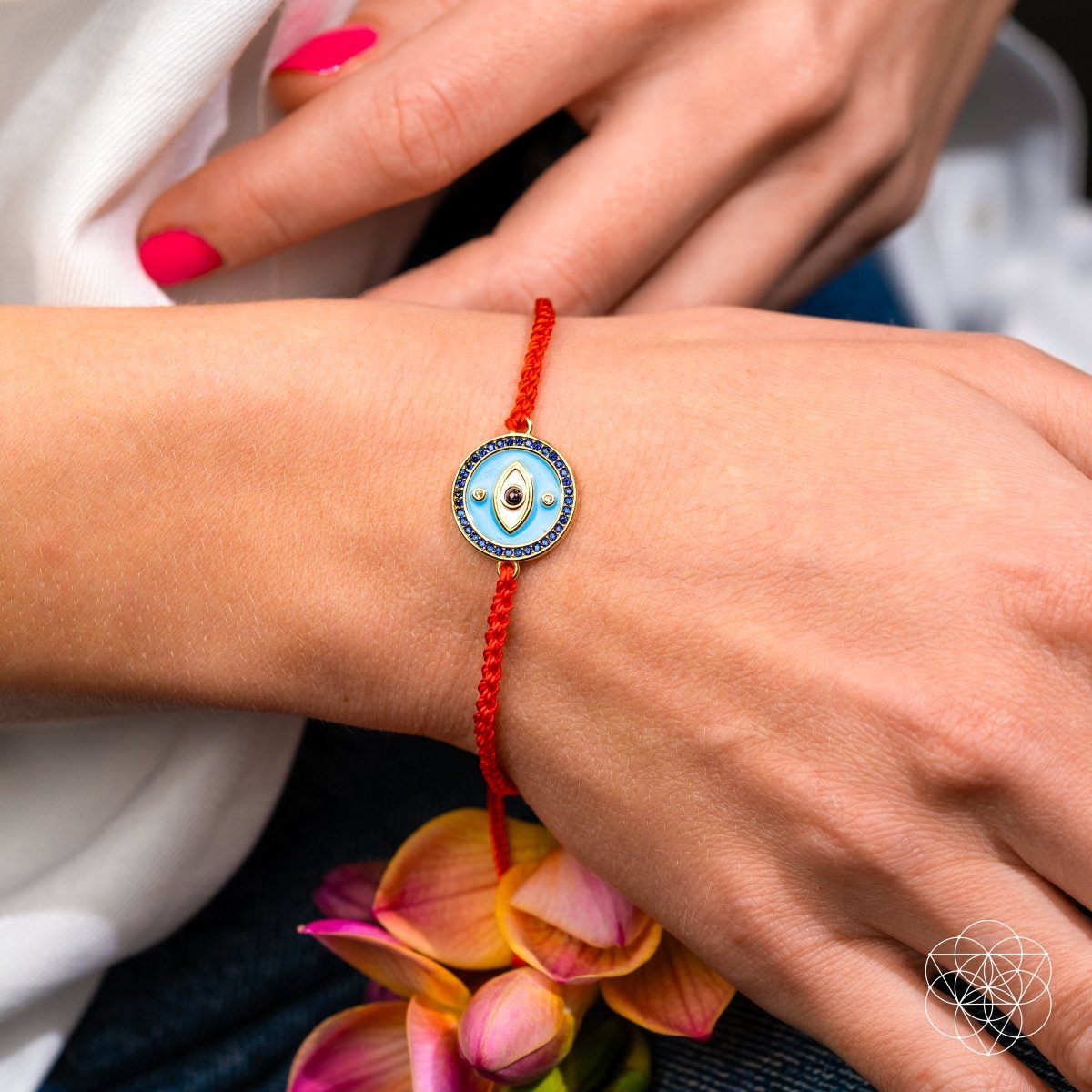 Red string bracelet with a gold-plated Evil Eye charm set with black Onyx — view 2