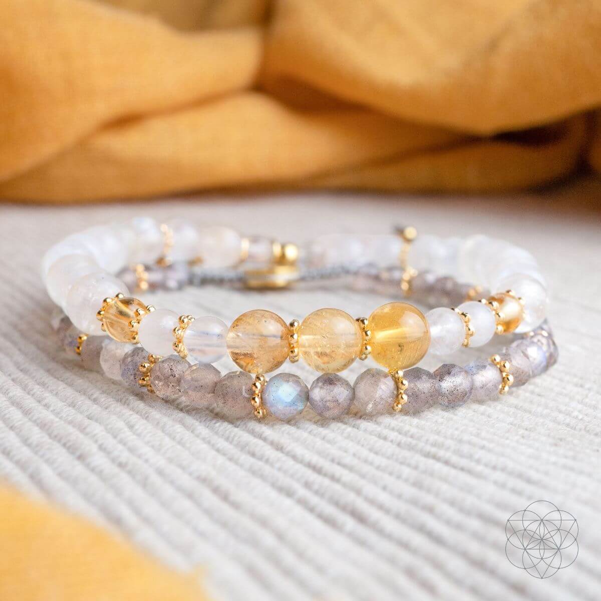 Two-bracelet wealth set with a gold-plated hamsa hand charm, citrine, moonstone and labradorite beads — view 4 of 7
