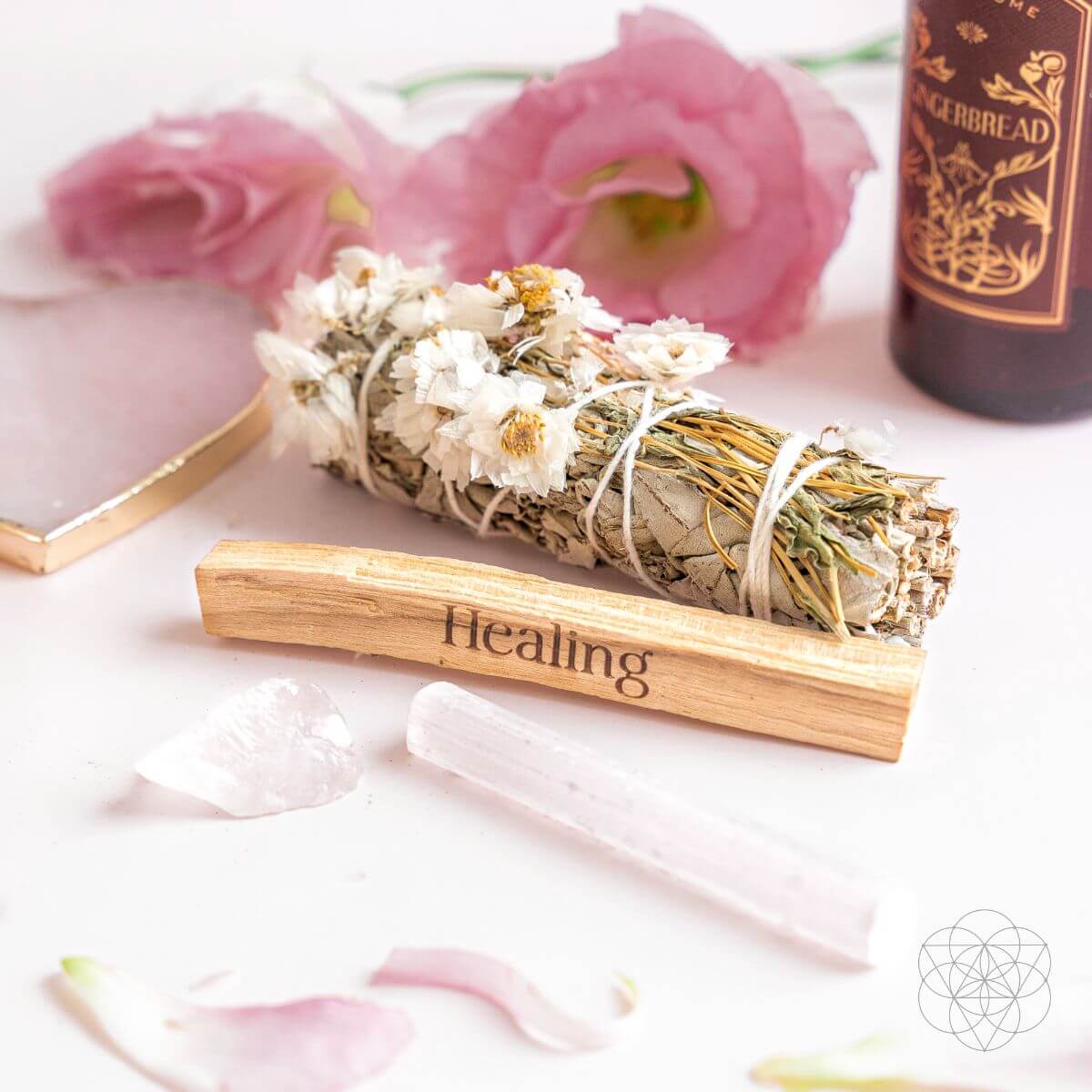 Five-piece smudge kit with white sage bundle, daisy flower bundle, engraved palo santo stick, selenite and clear quartz — detail view 4