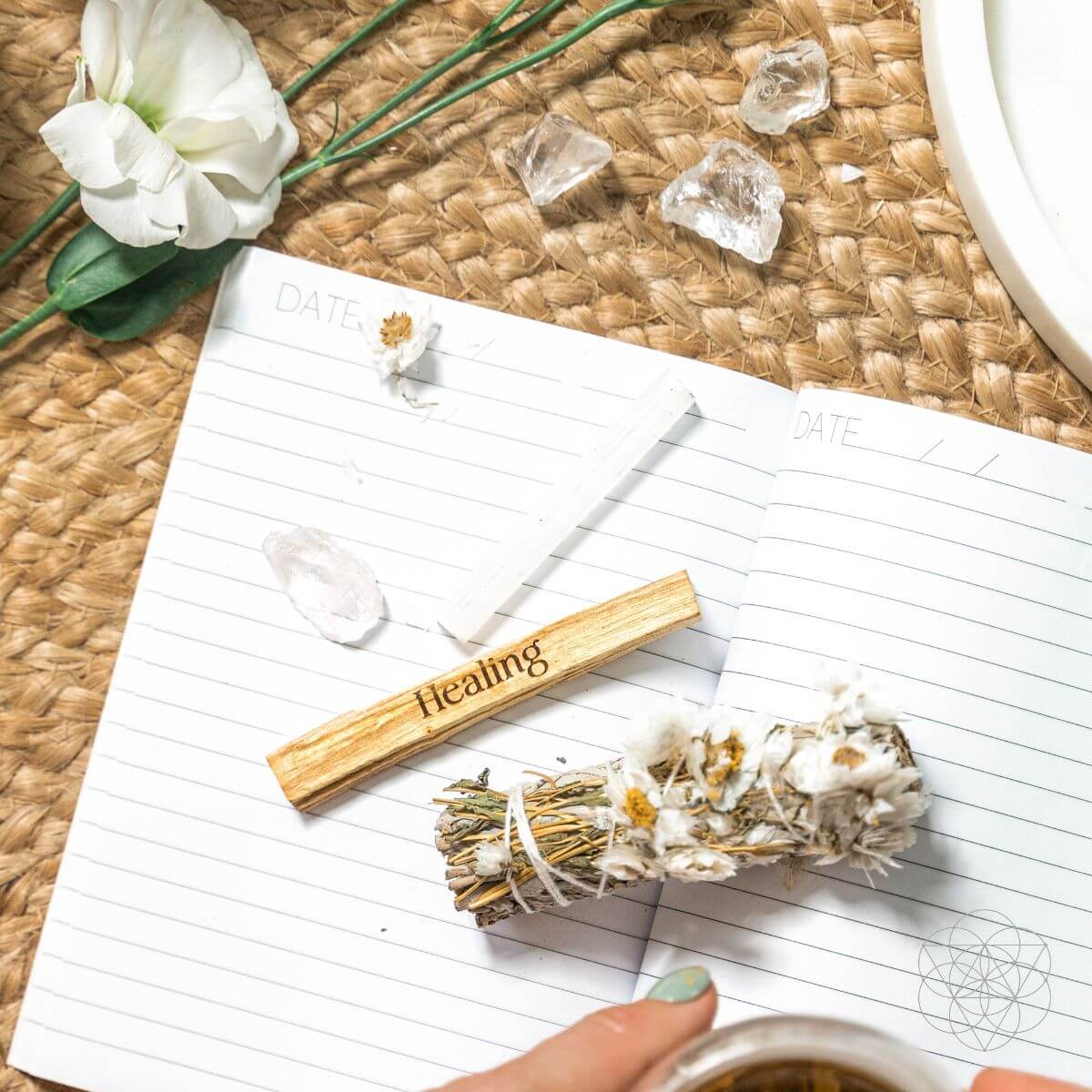 Five-piece smudge kit with white sage bundle, daisy flower bundle, engraved palo santo stick, selenite and clear quartz — detail view 3