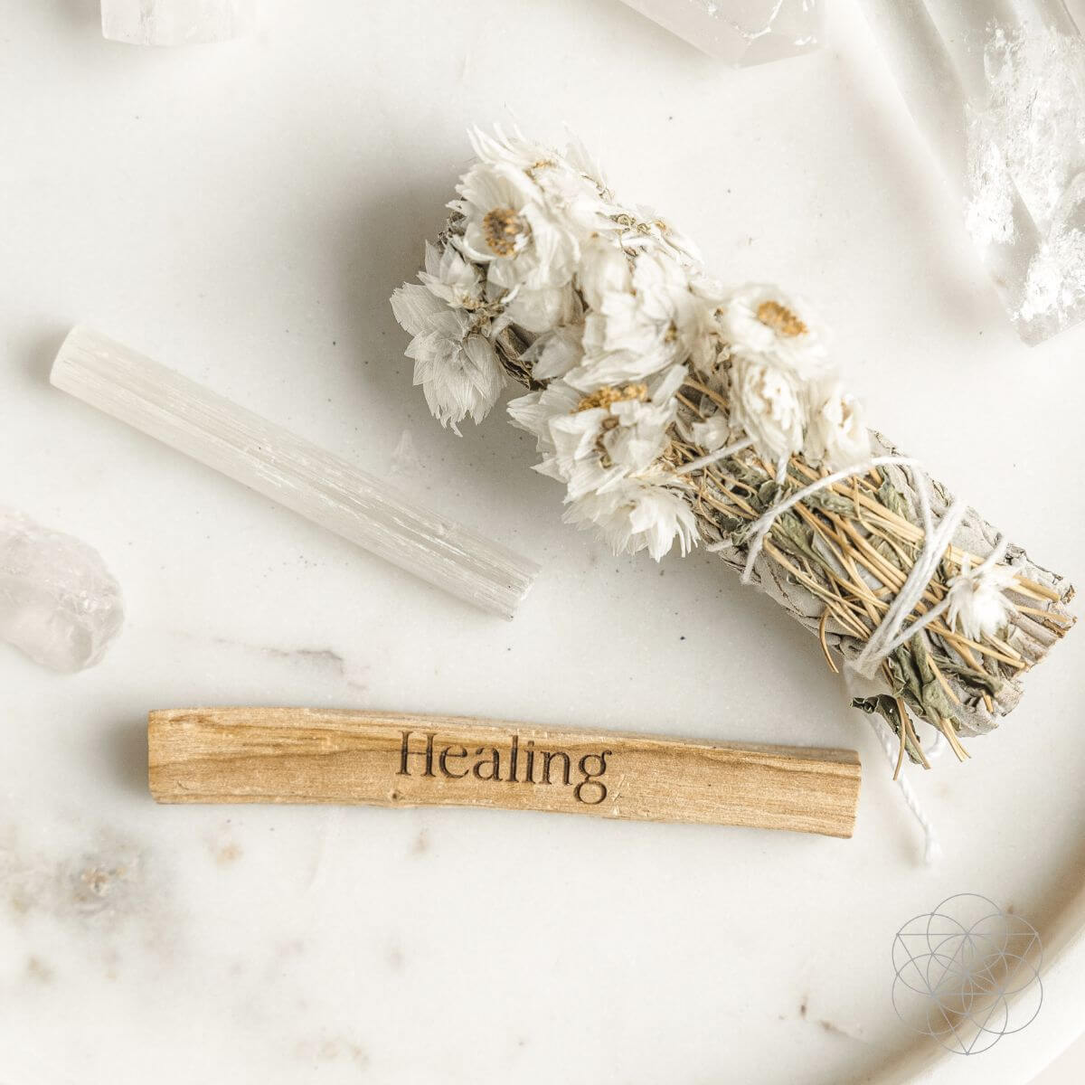 Five-piece smudge kit with white sage bundle, daisy flower bundle, engraved palo santo stick, selenite and clear quartz — detail view 5