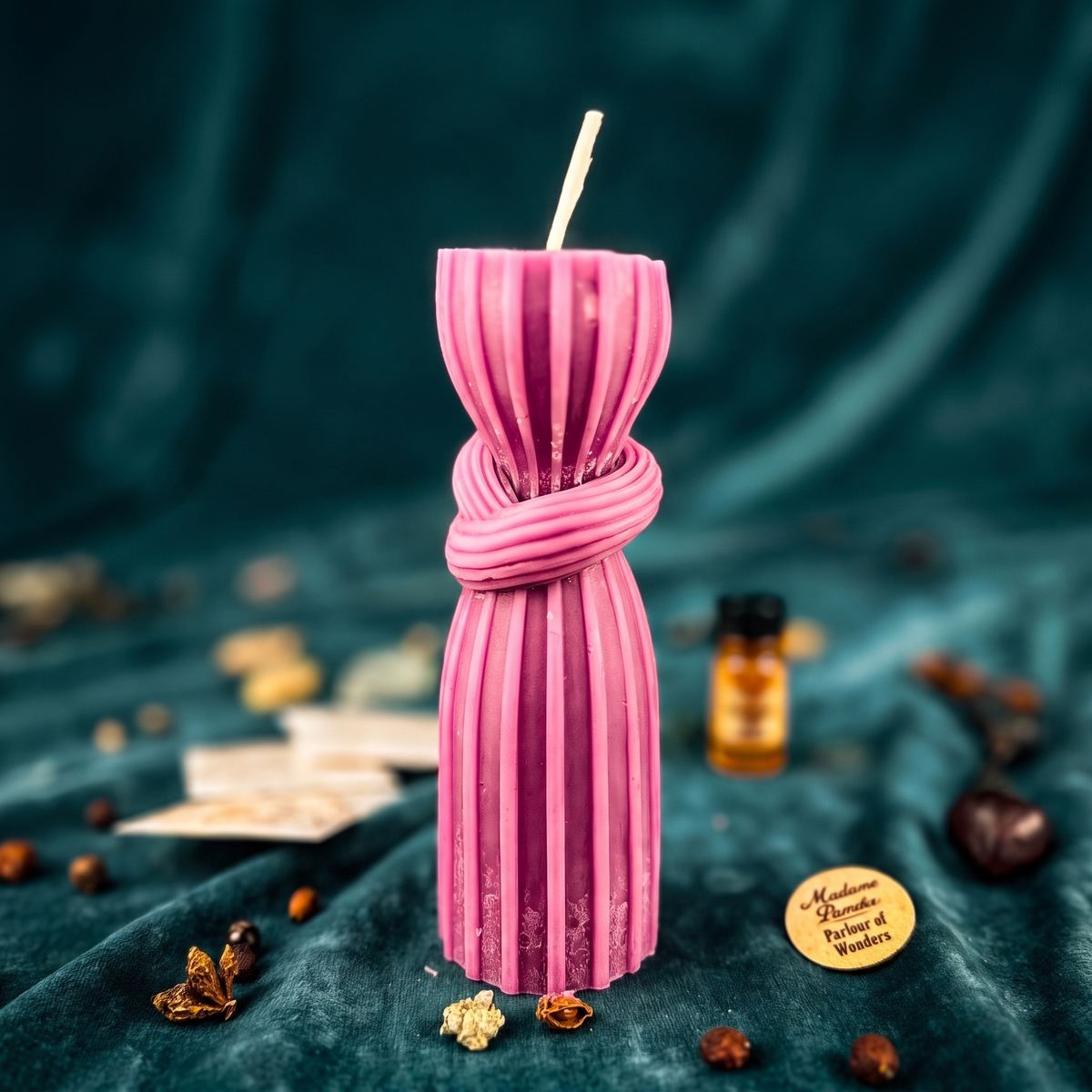 Binding Knot Candle Spell Kit laid out with the beeswax Binding Knot candle, three herbs, spiritual oil and instructions