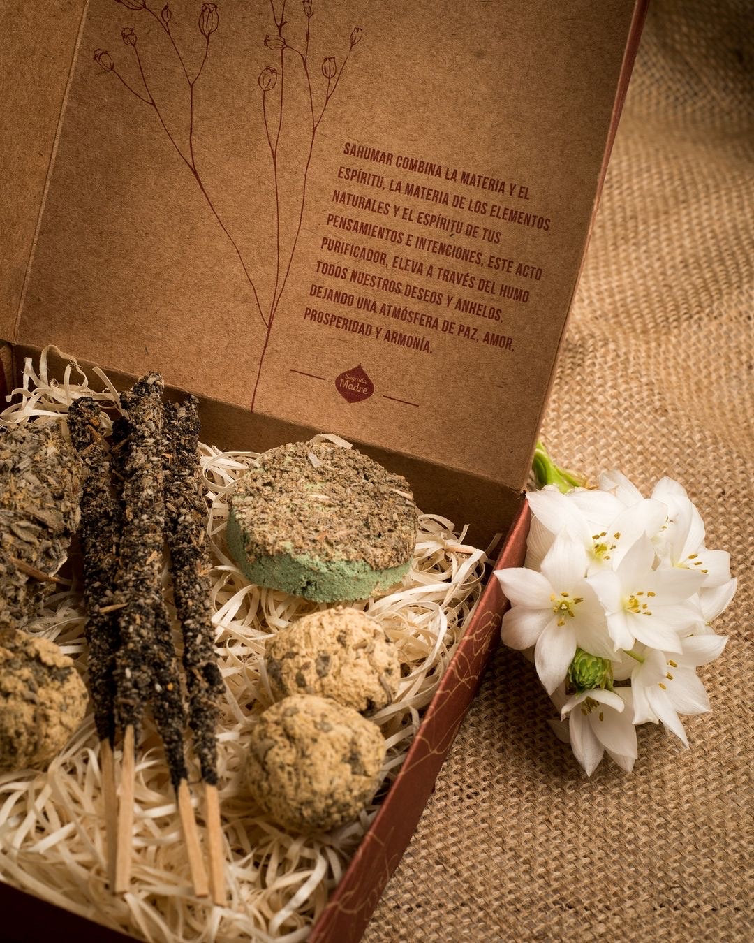 Open Sage Herbal gift box with its contents nested in wood shavings