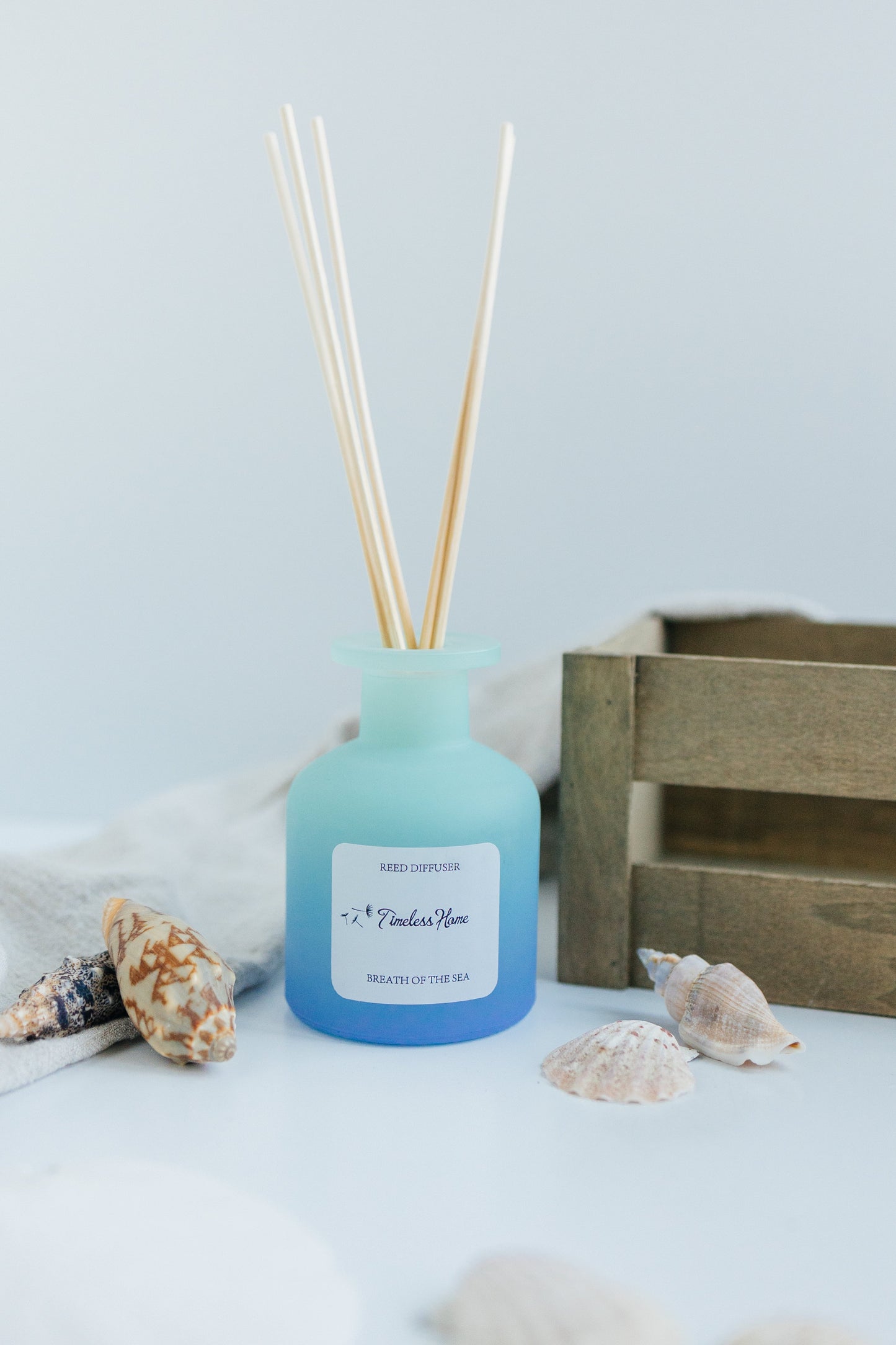 Breathe of the Sea reed diffuser in a frosted glass vessel with five natural reed sticks — view 6