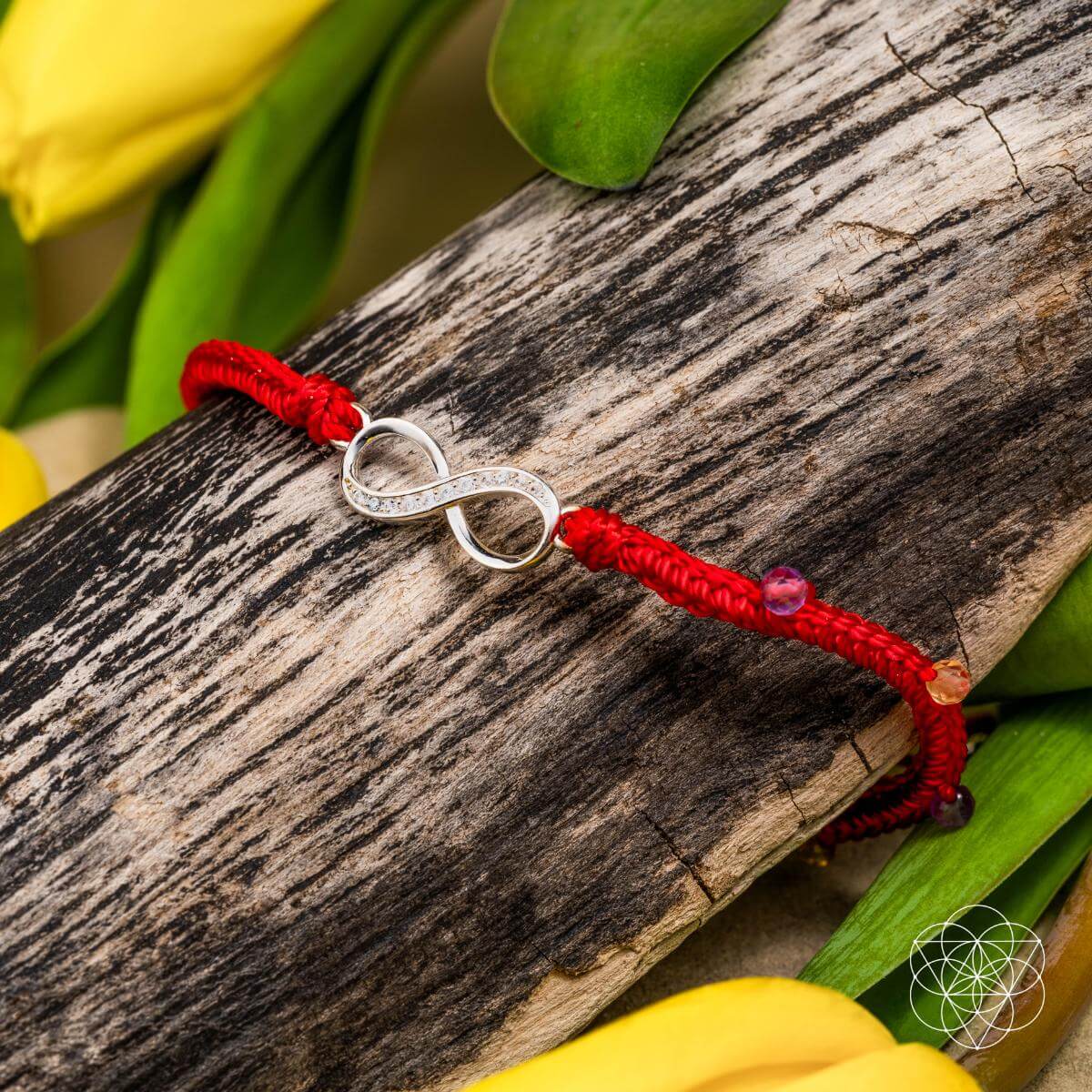 Eight-strand red string bracelet with a sterling silver infinity charm, citrine and amethyst beads — detail view 6