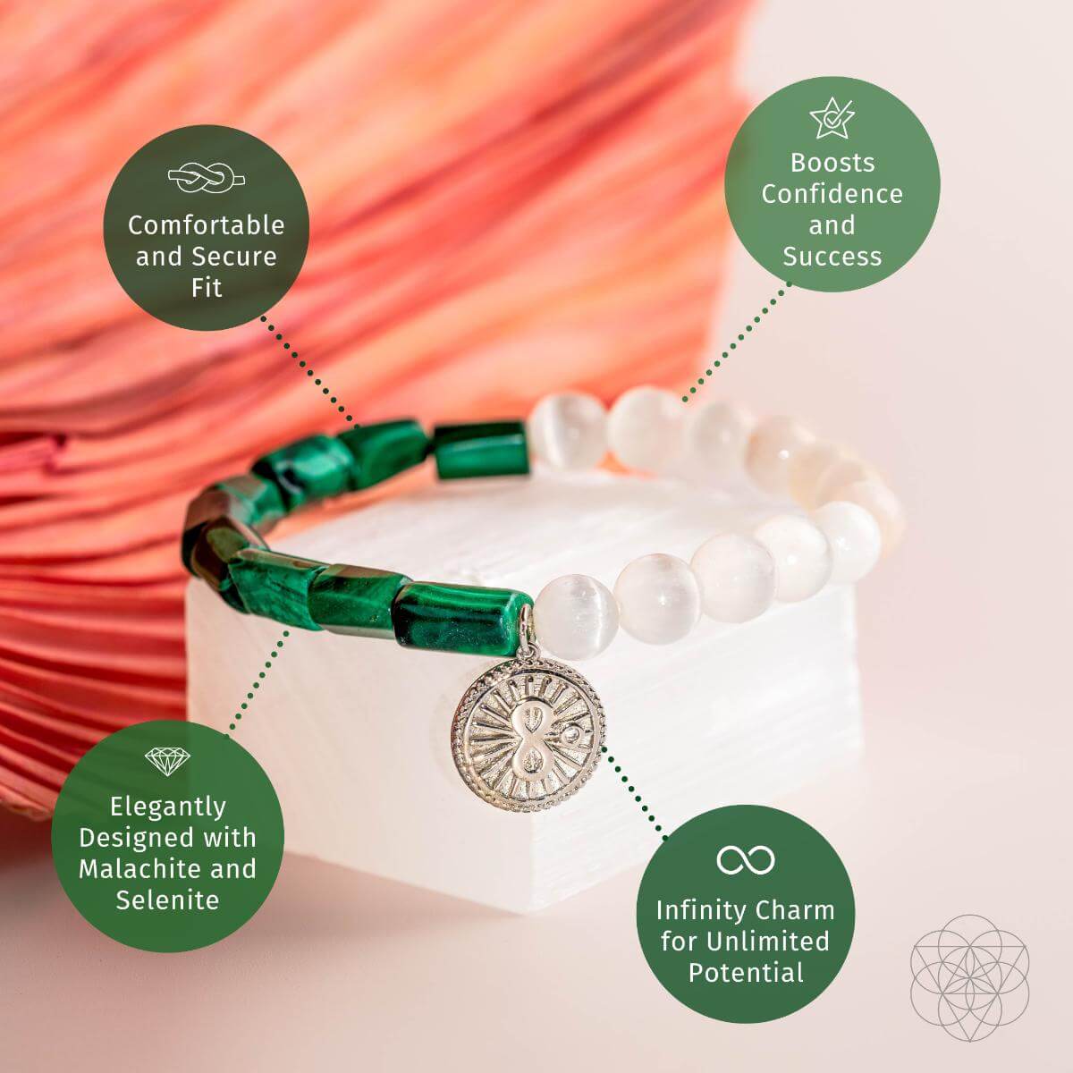 Bracelet with deep green malachite beads on one side and translucent selenite on the other, joined by a platinum-plated infinity charm — detail view 5