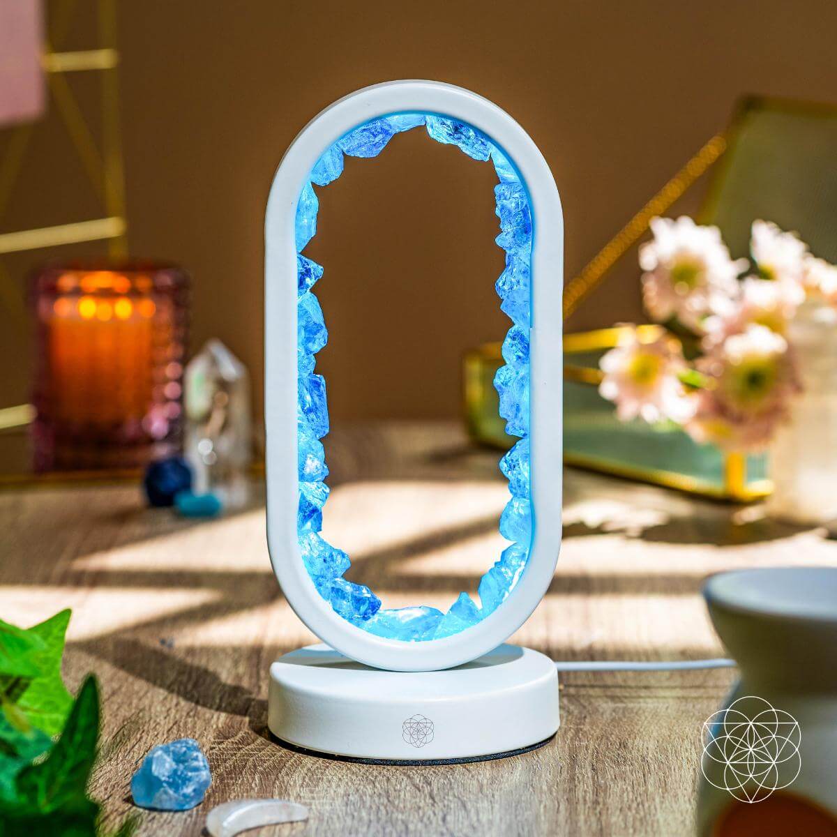 Aura-plated clear quartz lamp glowing in deep blue hues — detail view 5
