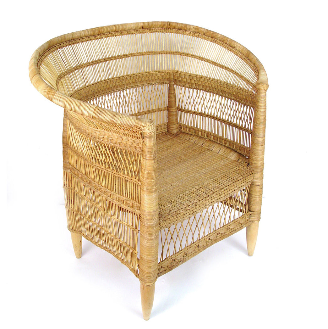 Malawi cane chair from the side, showing the tapered legs and open weave