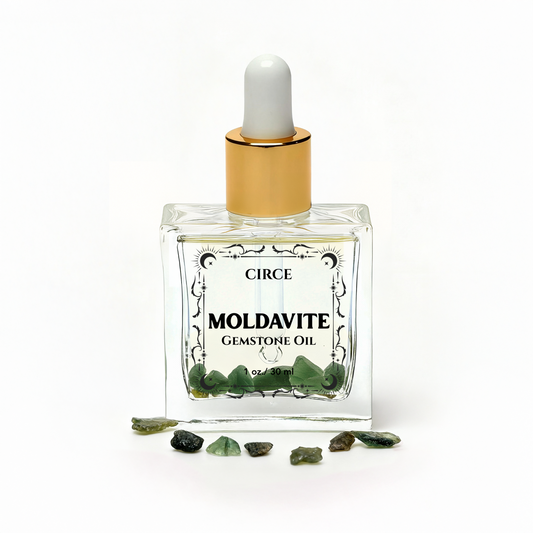 Moldavite ritual oil in a 1 ounce glass dropper bottle