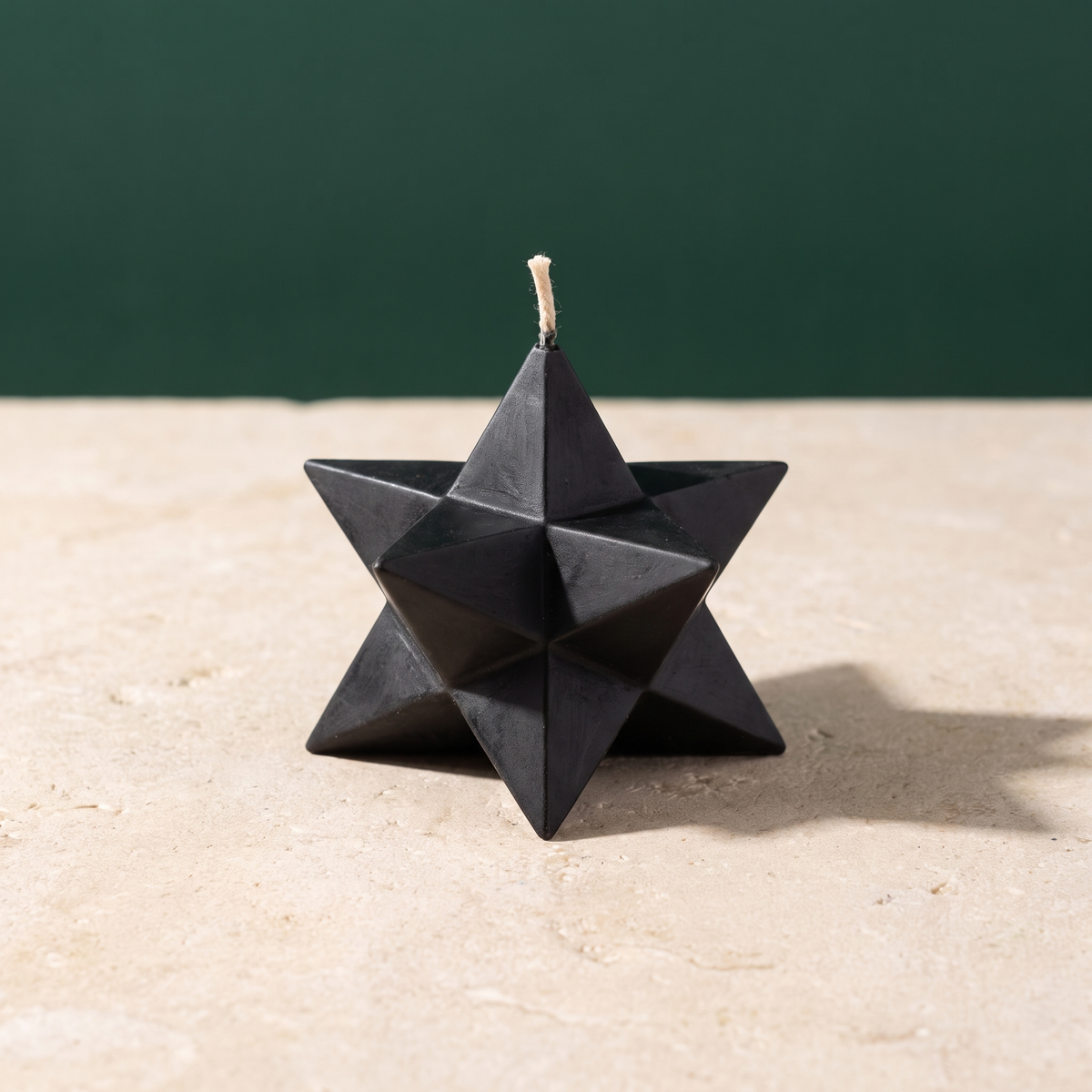 Beeswax Pentagram Merkaba spell candle standing upright, showing the pentagram and Merkaba sacred geometry