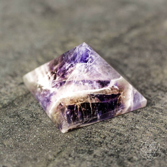 Natural amethyst pyramid with deep purple tones, associated with love and devotion — view 1 of 6