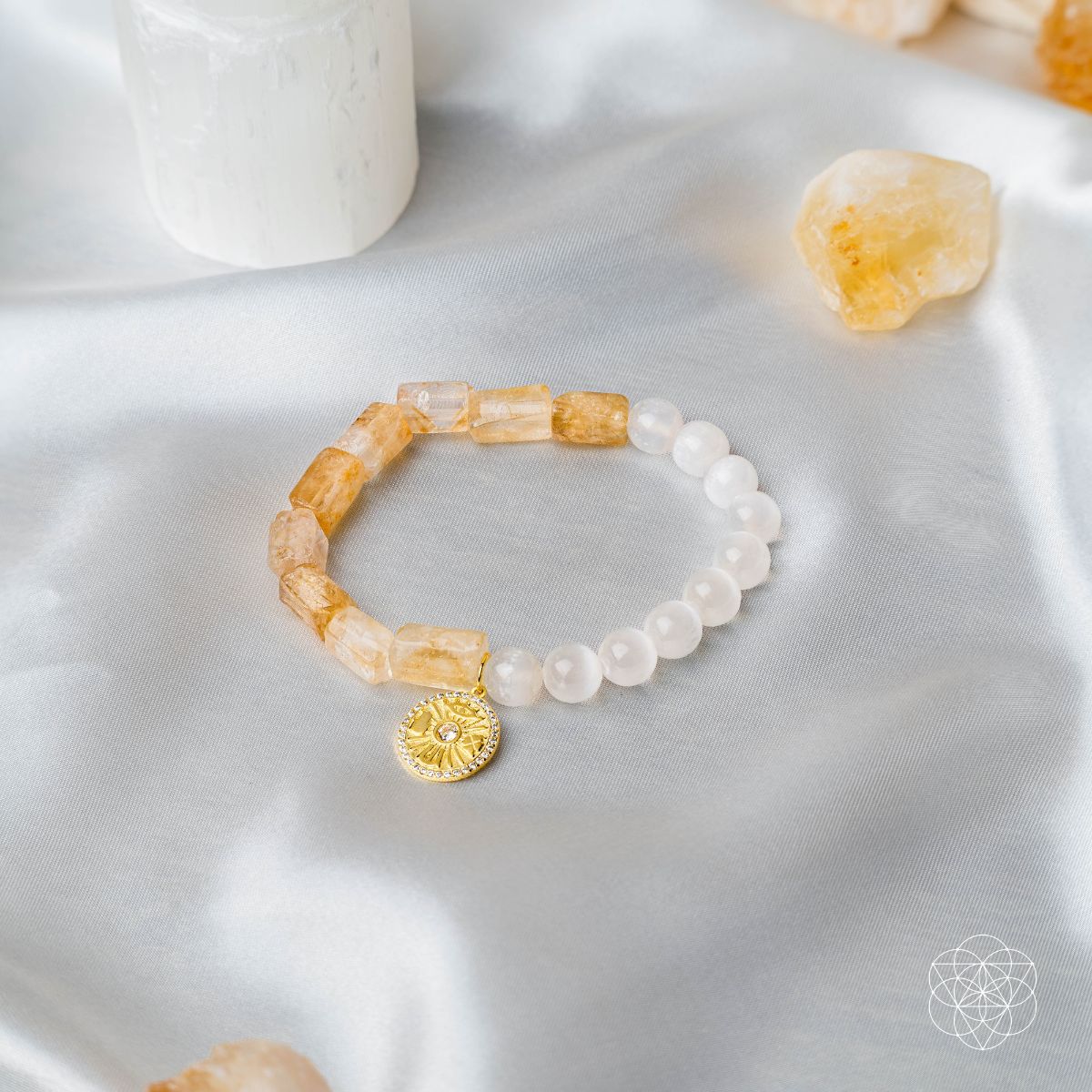 Citrine and selenite beaded bracelet with a gold-plated charm bearing the Eye of Horus, four-leaf clover, hamsa hand and horseshoe — view 7 of 8