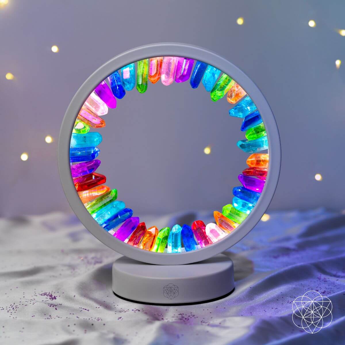 Halo-shaped lamp of rainbow aura-plated clear quartz points glowing in vivid colors — detail view 6