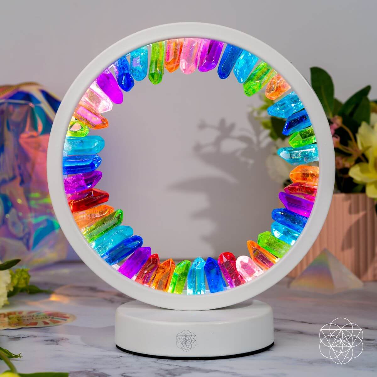 Halo-shaped lamp of rainbow aura-plated clear quartz points glowing in vivid colors — detail view 5