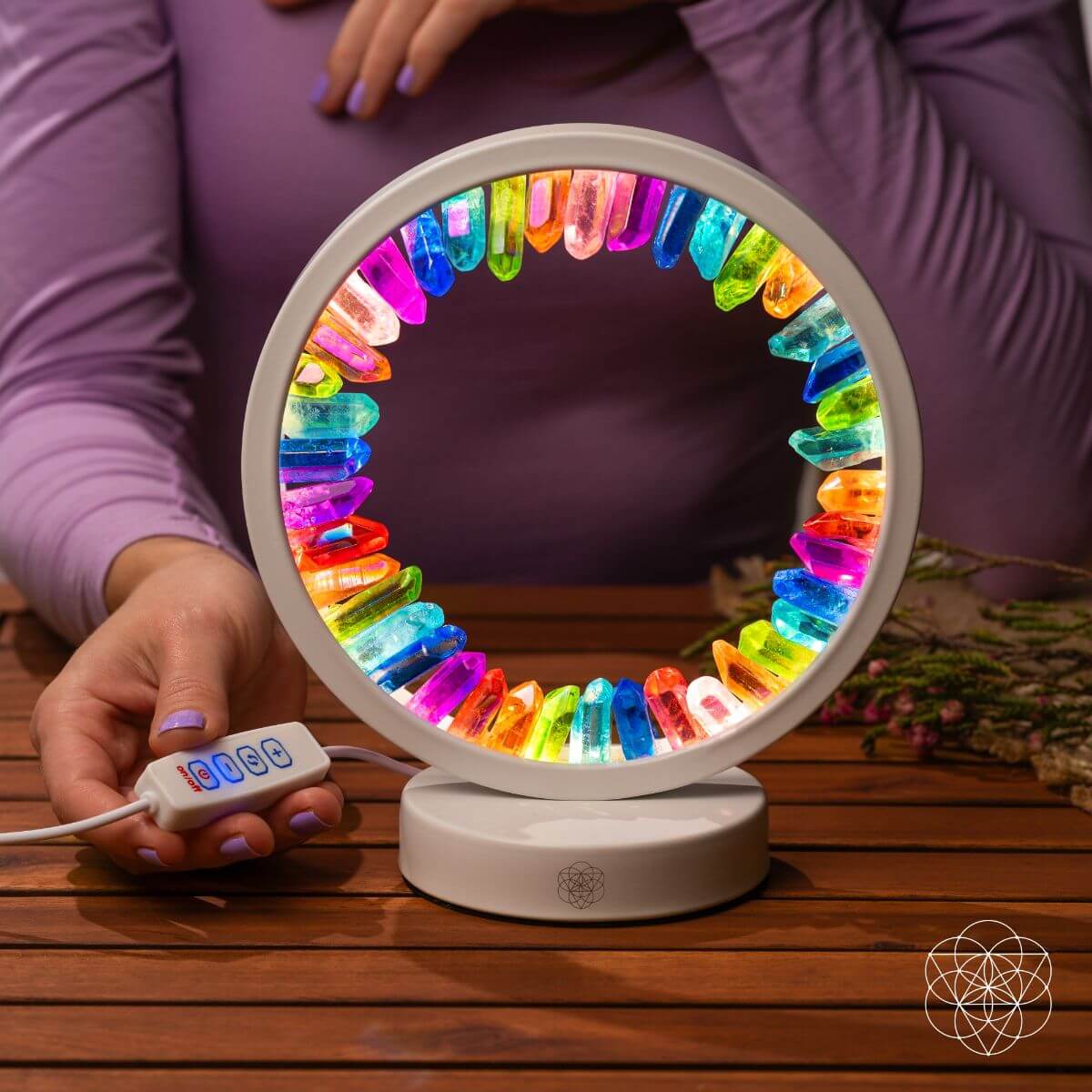 Halo-shaped lamp of rainbow aura-plated clear quartz points glowing in vivid colors — detail view 3