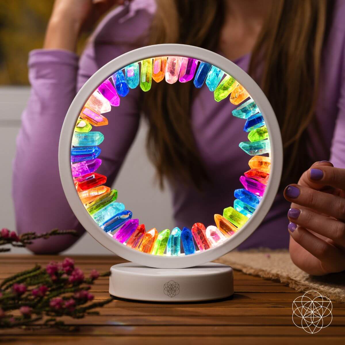 Halo-shaped lamp of rainbow aura-plated clear quartz points glowing in vivid colors — detail view 2