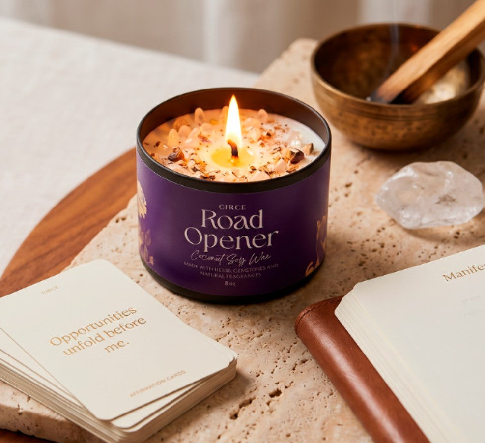 Road Opener spell candle in an 8 ounce jar with a cotton wick, shown from another angle