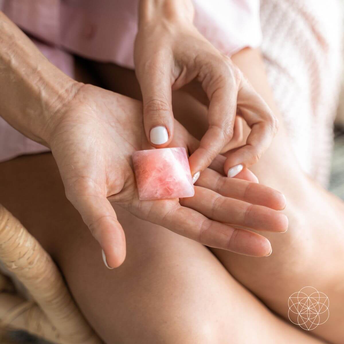 Polished natural rose quartz pyramid in soft pink — detail view 2