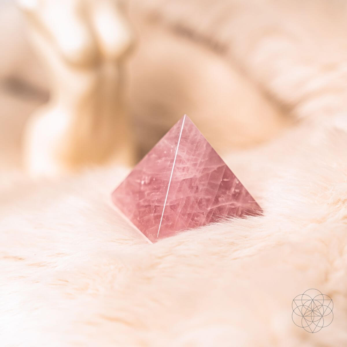 Polished natural rose quartz pyramid in soft pink — detail view 5