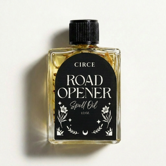 Road Opener ritual oil in a small twist-top glass bottle