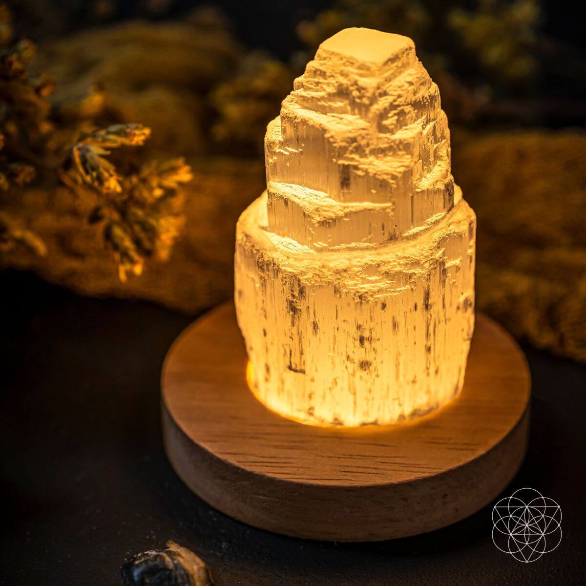 Natural selenite crystal lamp glowing with a soft warm light — view 2 of 7
