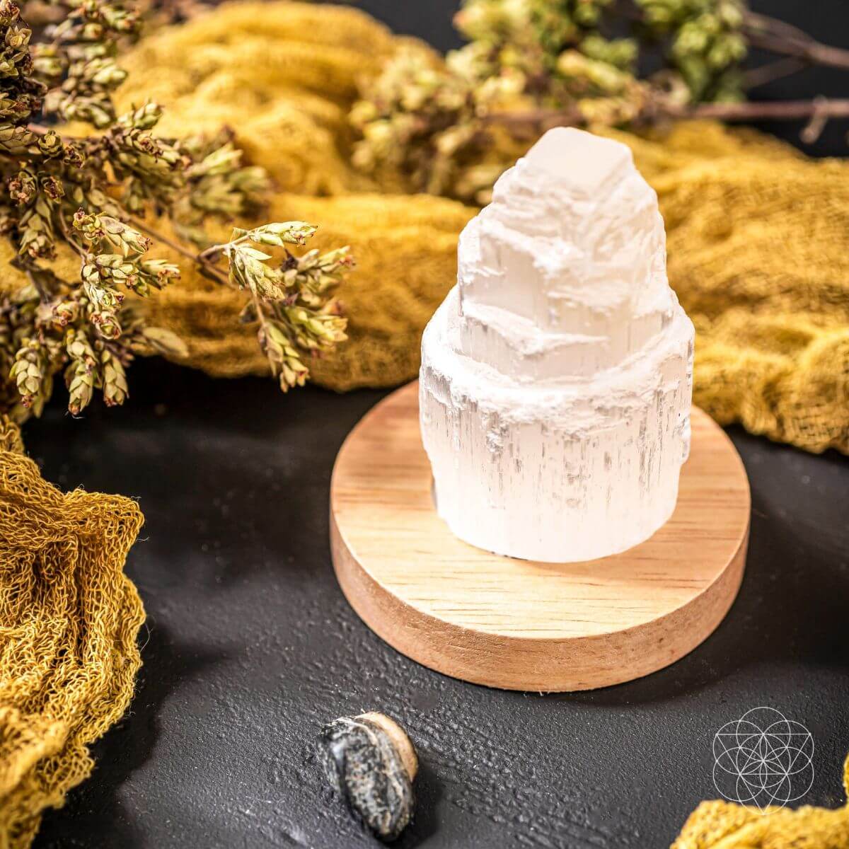 Natural selenite crystal lamp glowing with a soft warm light — view 4 of 7