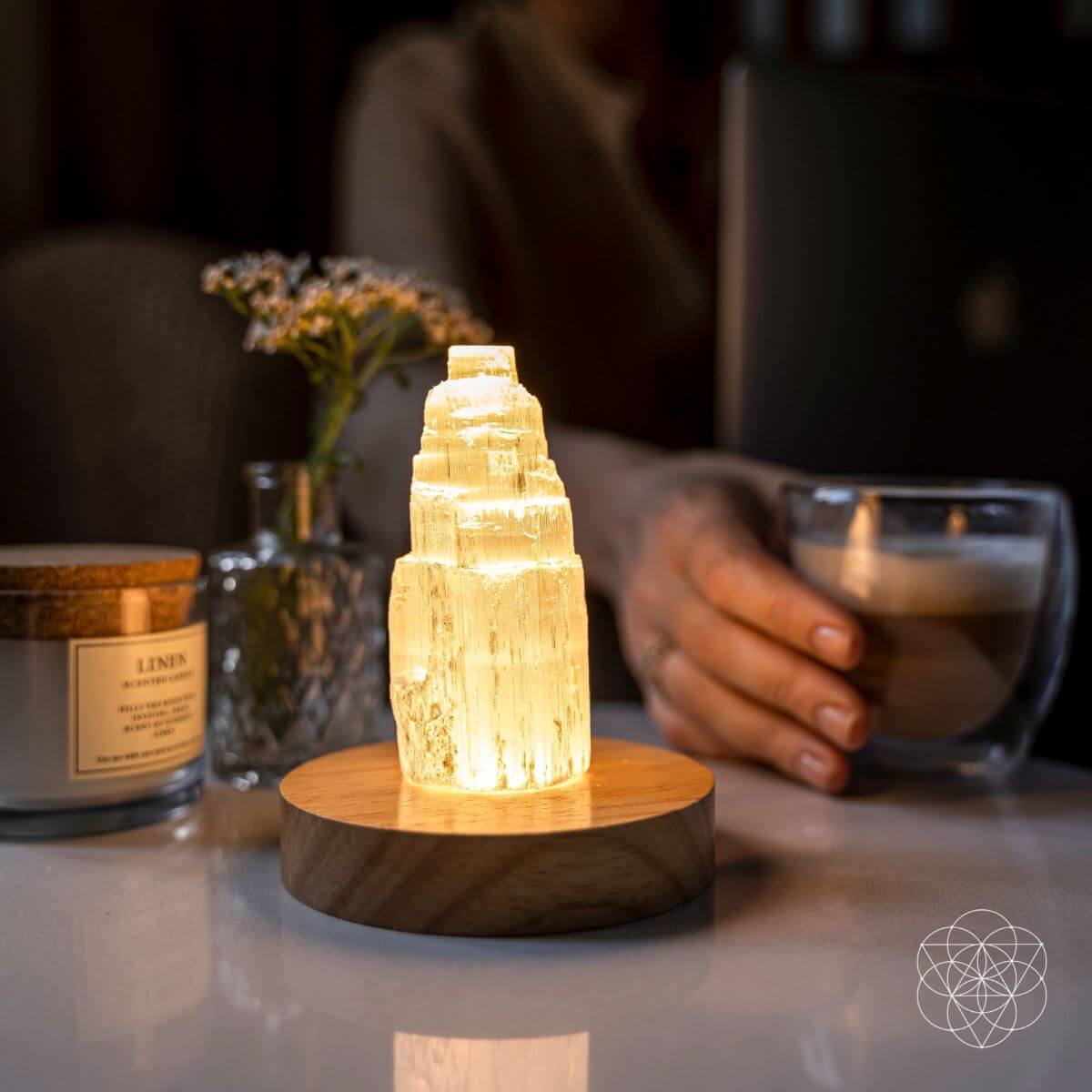Natural selenite crystal lamp glowing with a soft warm light — view 3 of 7