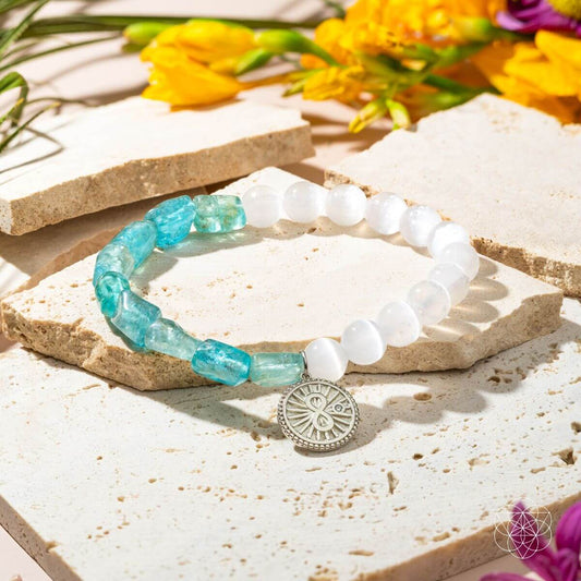Bracelet with raw blue apatite and translucent selenite beads joined by a platinum-plated infinity charm