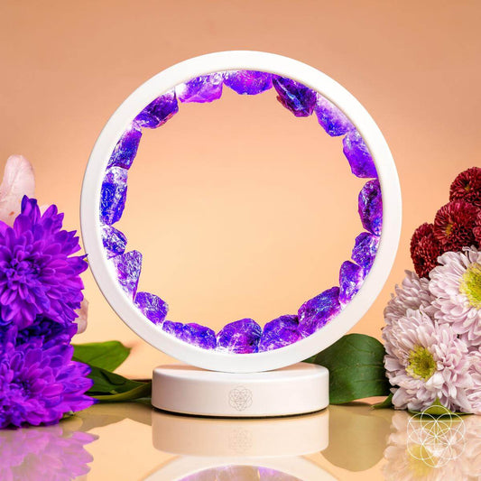 Circular amethyst halo lamp glowing in soft purple light