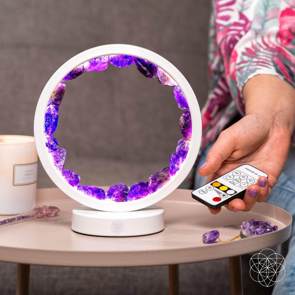 Circular amethyst halo lamp glowing in soft purple light — detail view 3