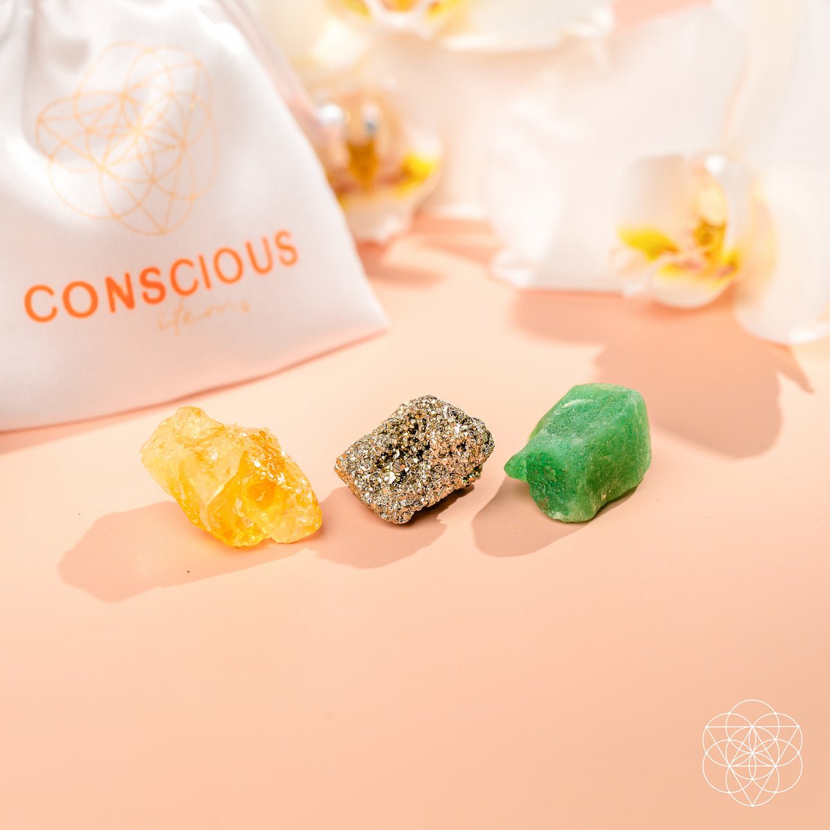 Three raw abundance stones — golden Citrine, metallic Pyrite, and green Aventurine — view 5
