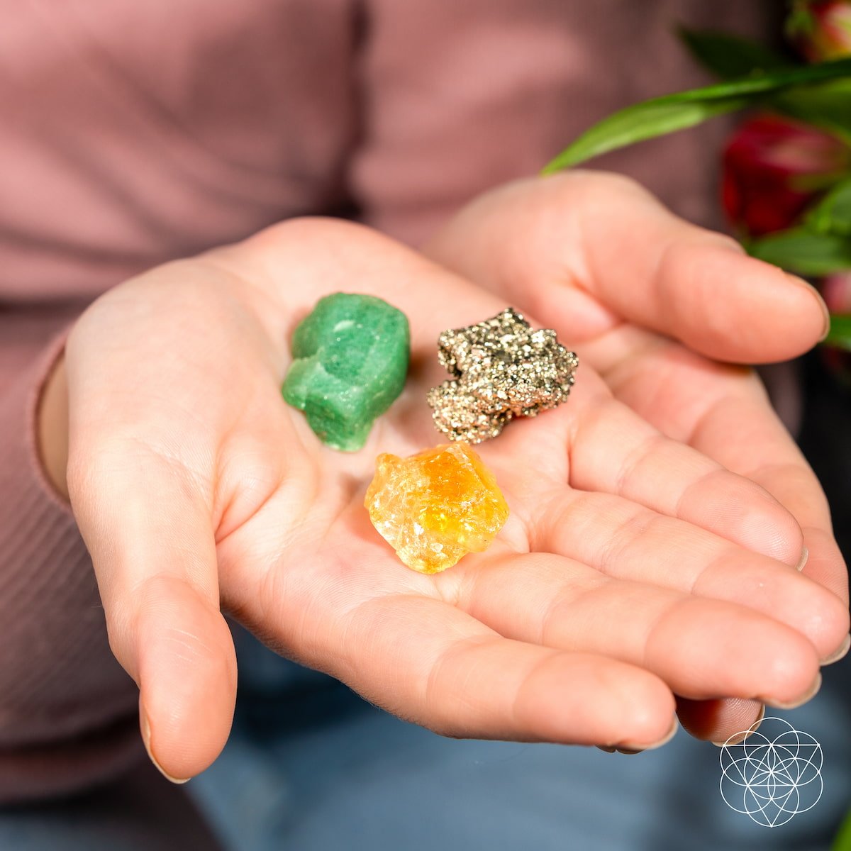 Three raw abundance stones — golden Citrine, metallic Pyrite, and green Aventurine — view 2