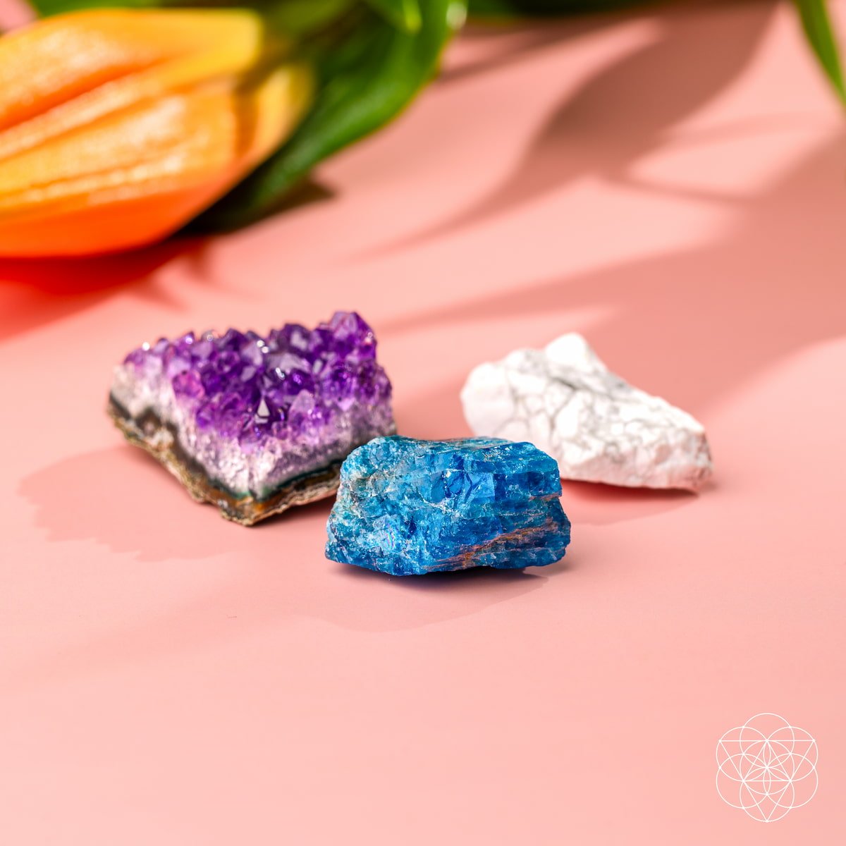 Three raw calming stones — purple Amethyst, blue Apatite, and white Howlite — view 3