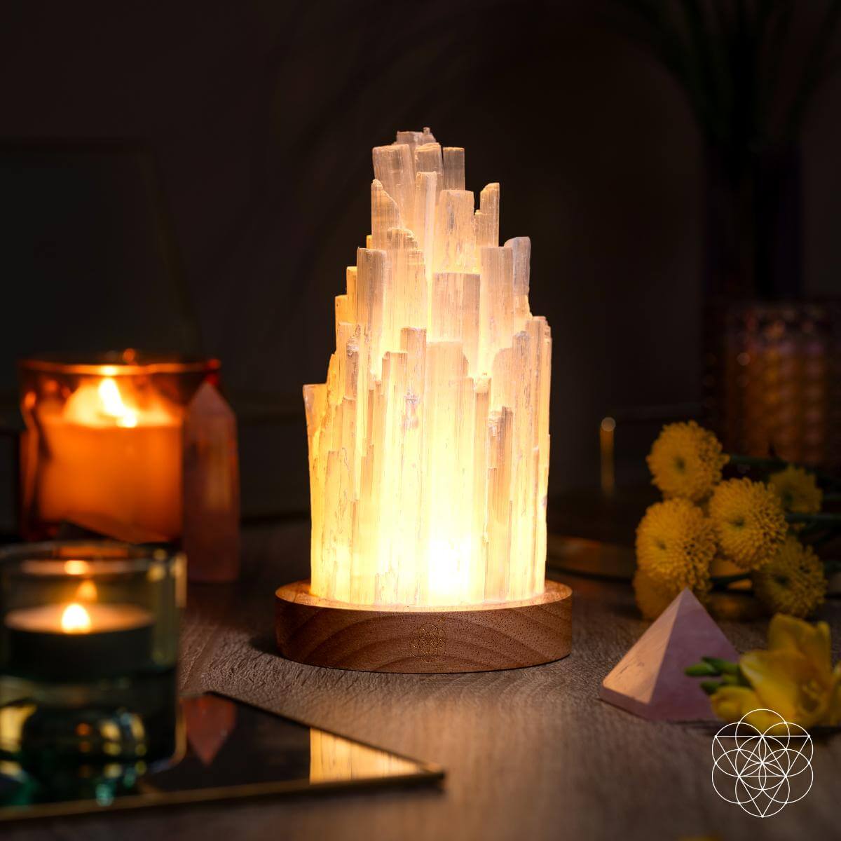 Tall Selenite crystal lamp glowing on a walnut base — view 3