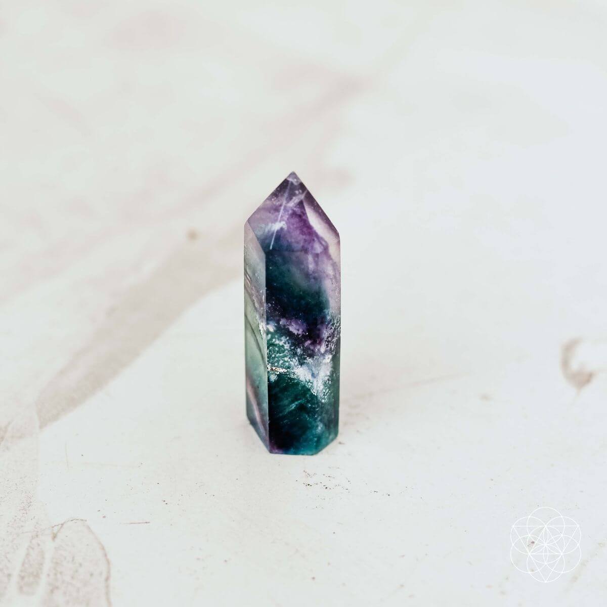 Natural fluorite cleansing stone with green and purple banding (view 4)