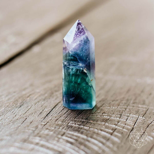 Natural fluorite cleansing stone with green and purple banding