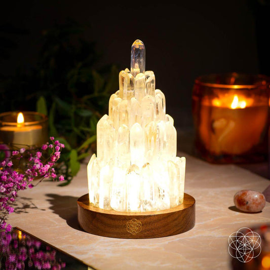 Tall carved clear quartz tower lamp lit from within