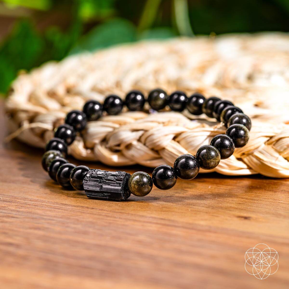 Bracelet of black tourmaline beads and golden obsidian beads with a warm sheen — detail view 4