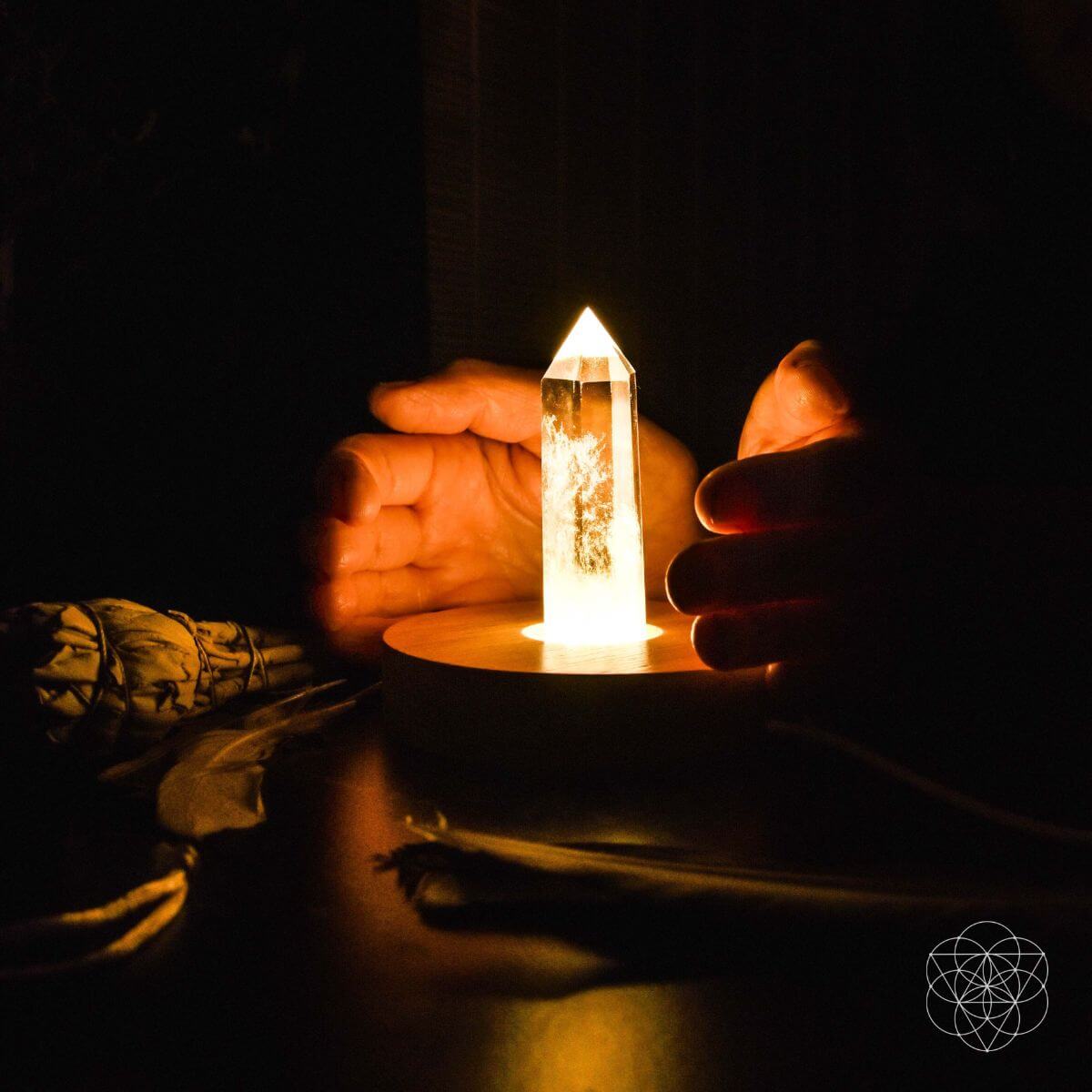 Clear quartz crystal lamp with a soft warm glow — detail view 2