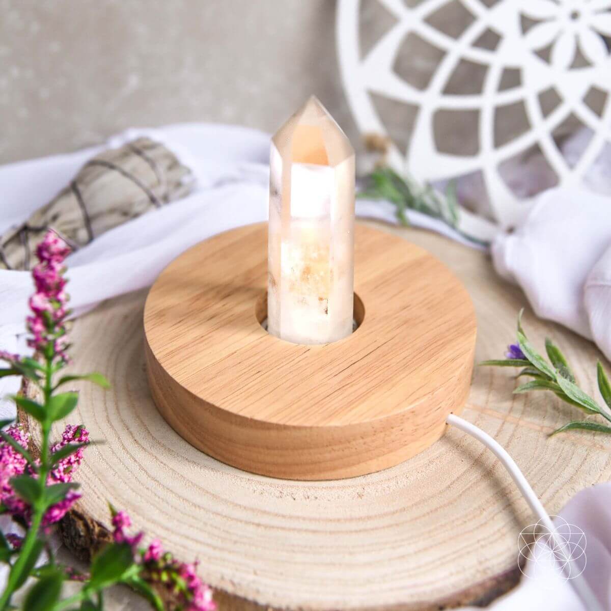 Clear quartz crystal lamp with a soft warm glow — detail view 3