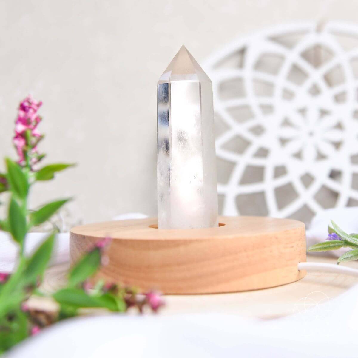 Clear quartz crystal lamp with a soft warm glow — detail view 4