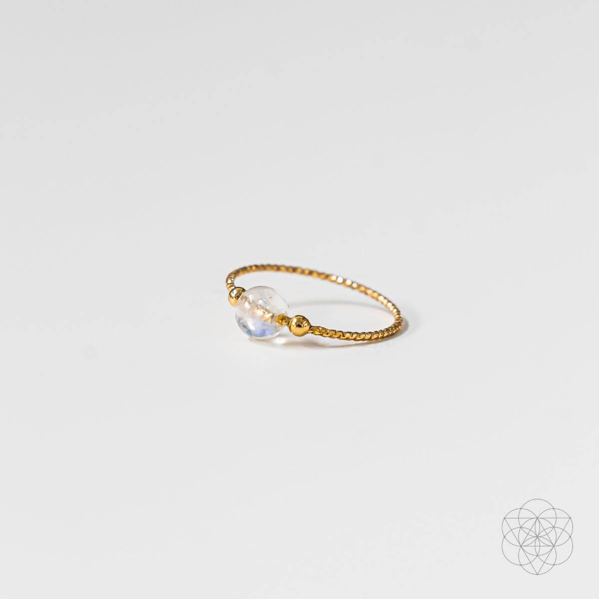 Elegant moonstone ring with a pearly white cabochon stone — view 5 of 6