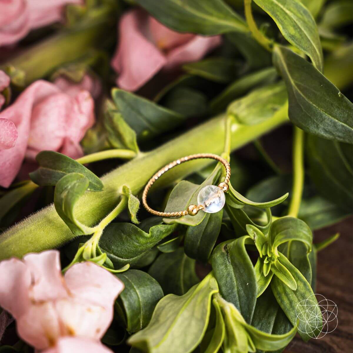 Elegant moonstone ring with a pearly white cabochon stone — view 6 of 6