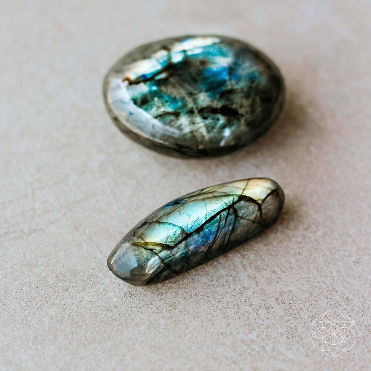 Raw labradorite stone shimmering with green and blue flashes — view 6 of 6
