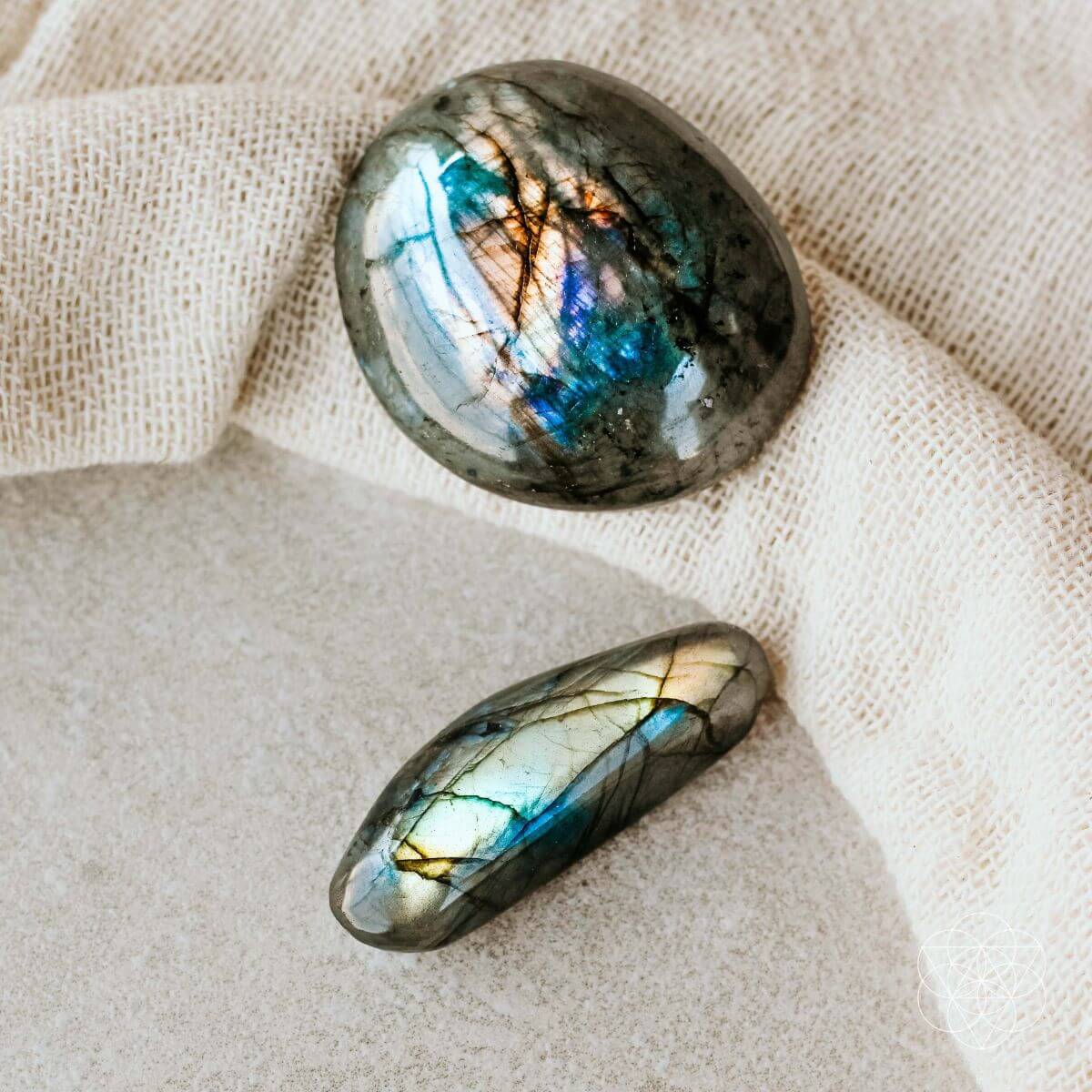 Raw labradorite stone shimmering with green and blue flashes — view 5 of 6