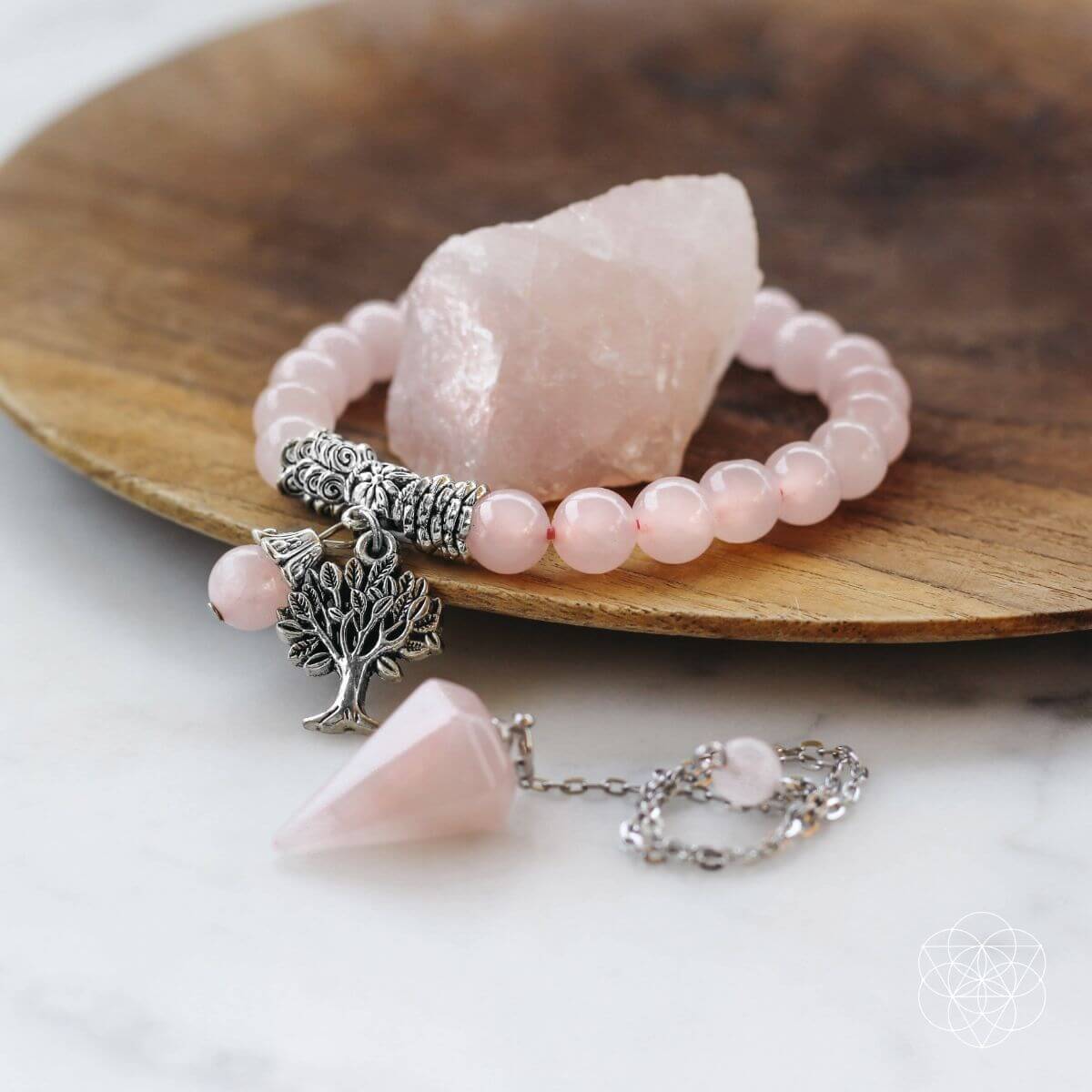 Rose quartz set with a beaded bracelet with silver Tree of Life charm, a natural rose quartz stone and a rose quartz dowsing pendulum — detail view 4