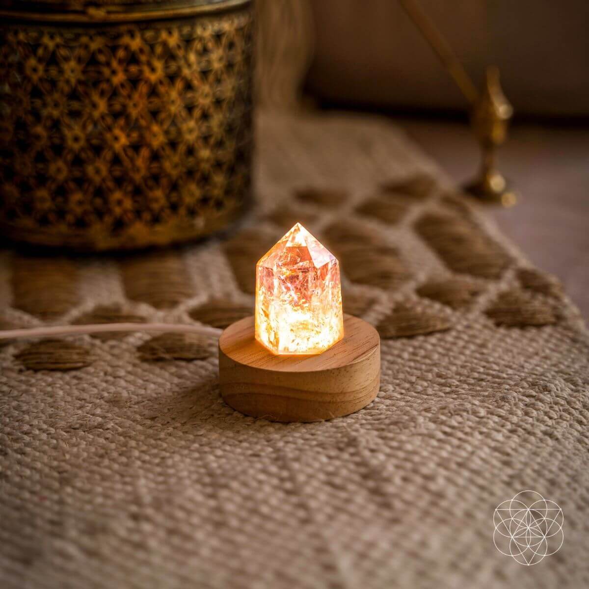 Amethyst crystal point lamp on a bedside table with soft purple light — view 3 of 7