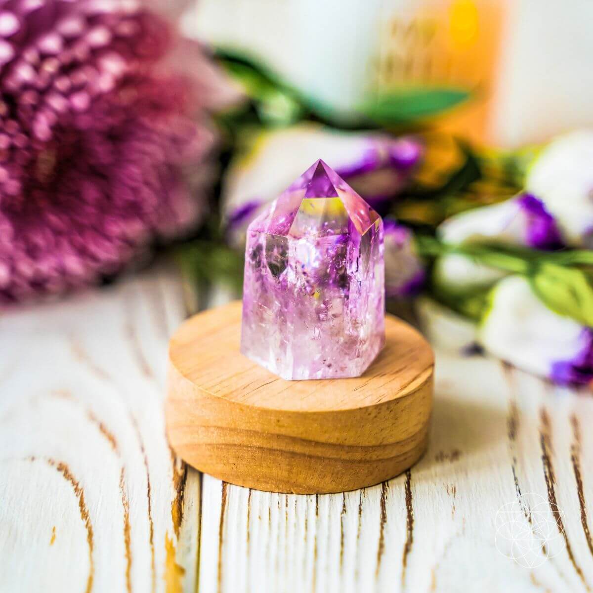 Amethyst crystal point lamp on a bedside table with soft purple light — view 4 of 7