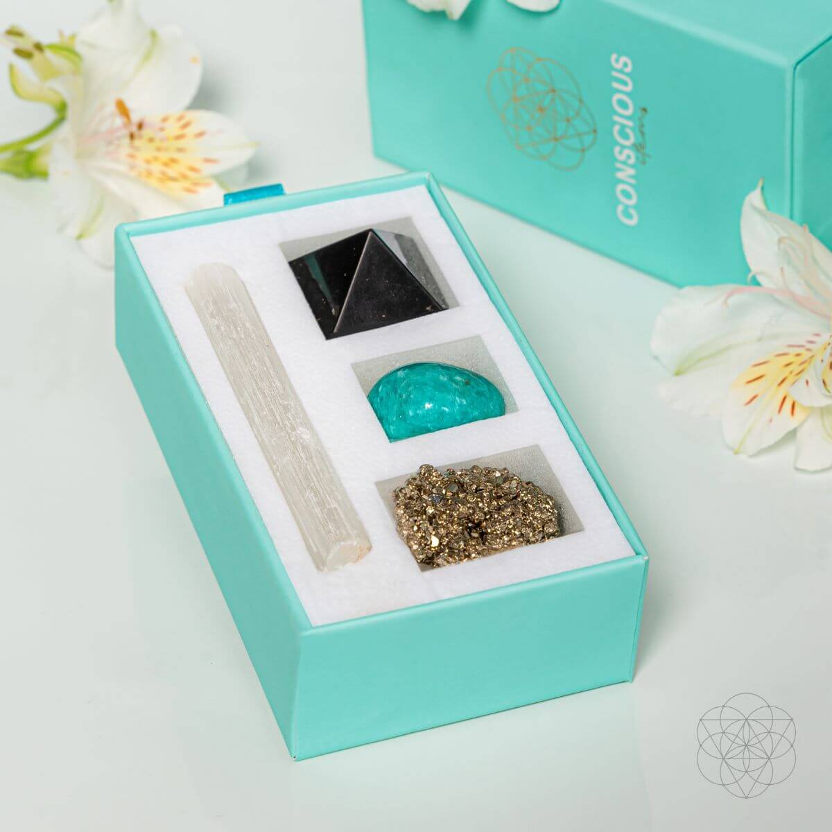 Workspace protection crystal kit with a selenite wand, hand-cut shungite pyramid, raw pyrite and tumbled amazonite — view 3 of 6